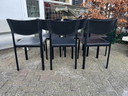 Tuiglederen stoelen uit de jaren 80