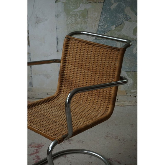 Image 1 of Mid century armstoel van riet en staal, jaren 1940