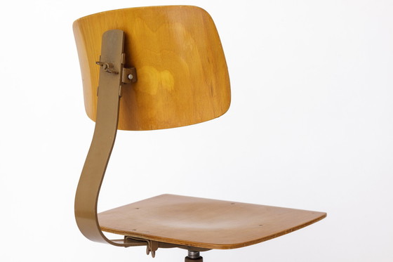 Image 1 of Set van 3 industriële vintage draaistoelen - Duits ontwerp 1950S