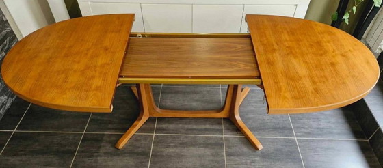 Image 1 of Baumann uitschuifbare tafel van teak en palissander, 1970
