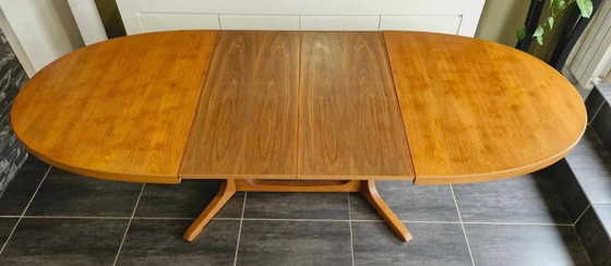 Image 1 of Baumann uitschuifbare tafel van teak en palissander, 1970
