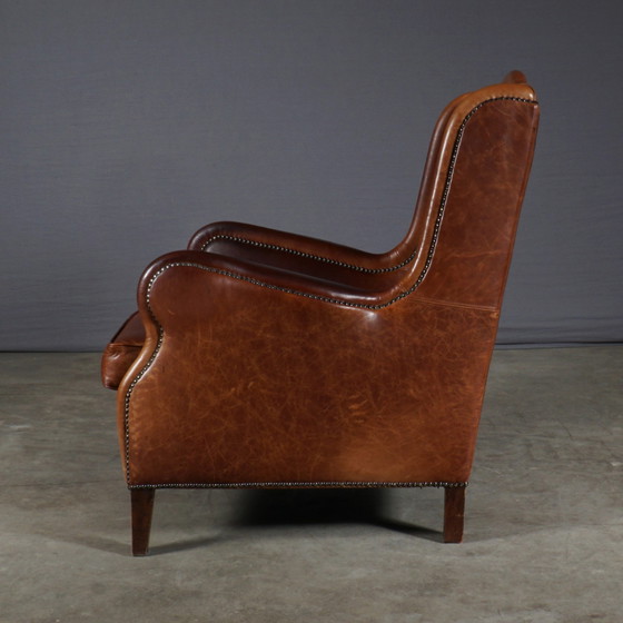 Image 1 of Vintage Lederen Wingback Fauteuil – Bruin – Metalen Nagels