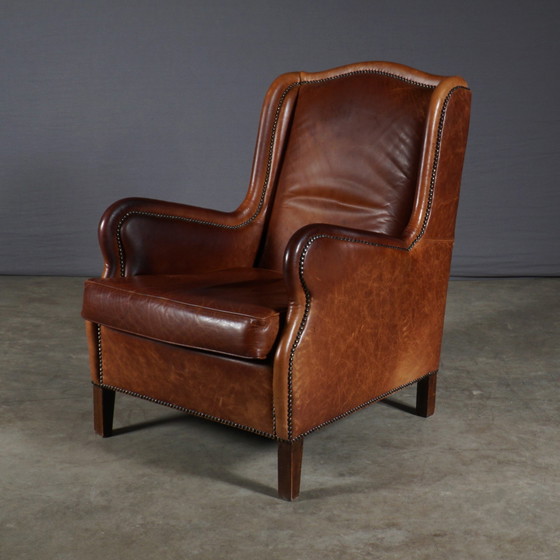 Image 1 of Vintage Lederen Wingback Fauteuil – Bruin – Metalen Nagels