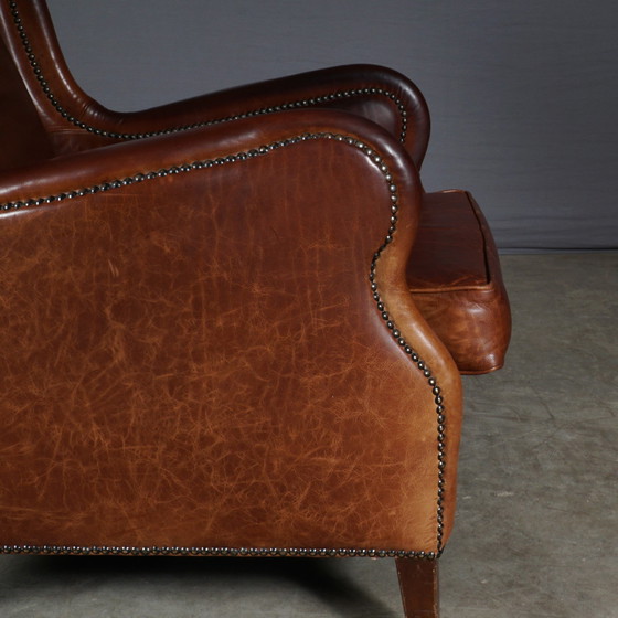 Image 1 of Vintage Lederen Wingback Fauteuil – Bruin – Metalen Nagels