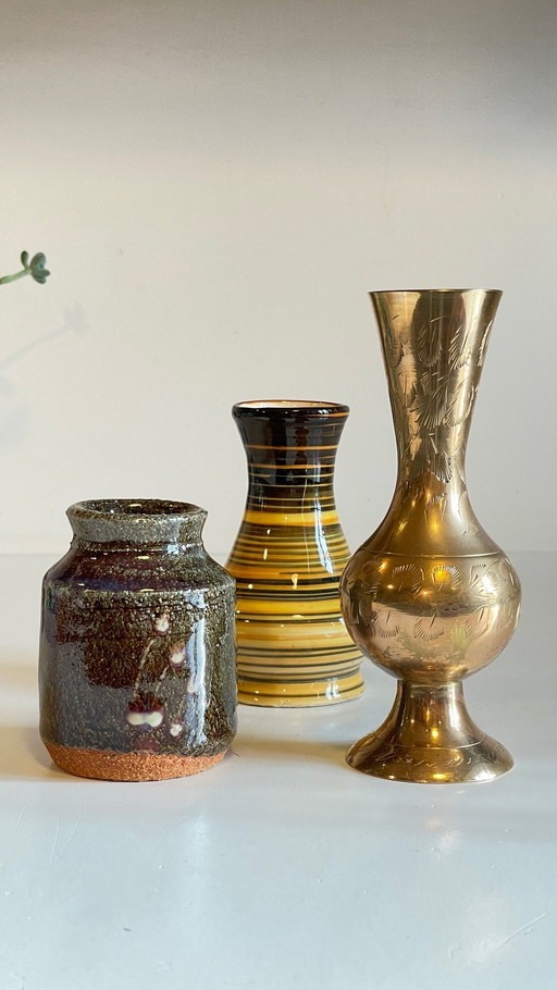 Trio vintage vazen van messing en glas