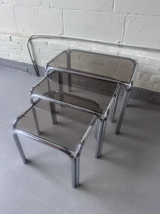 Image 1 of Vintage glazen tafels nesting tafels