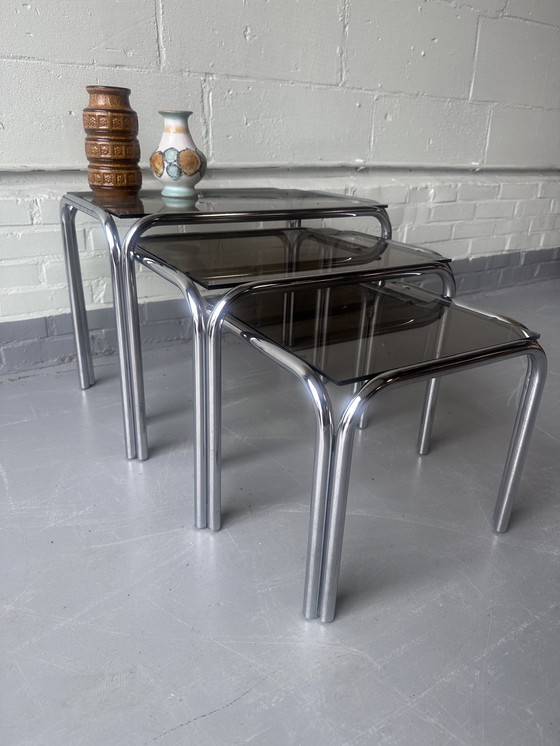 Image 1 of Vintage glazen tafels nesting tafels