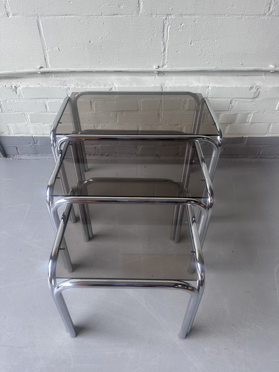 Image 1 of Vintage glazen tafels nesting tafels
