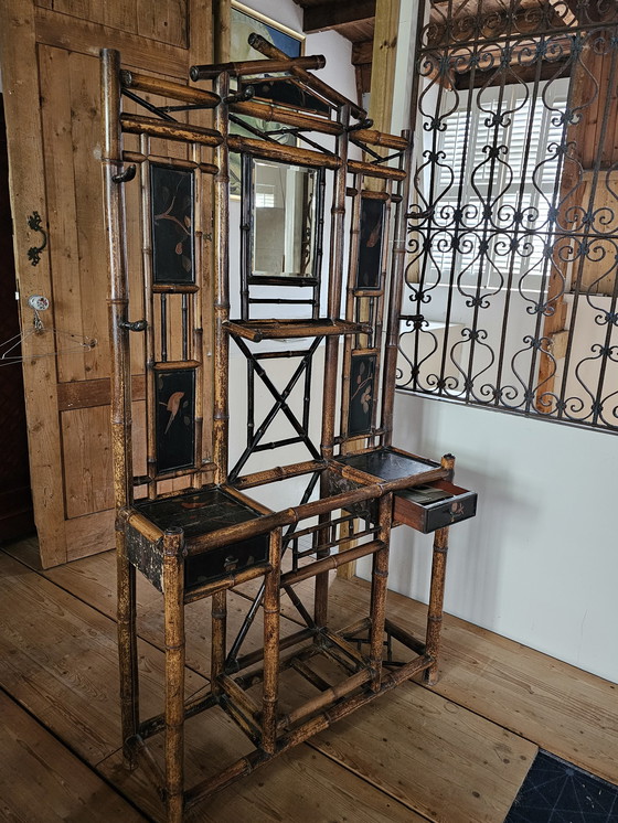 Image 1 of Mid-Century Franse Vintage Bamboe met chinoiserie Rekken