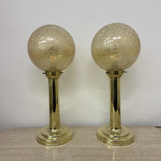 Image 1 of Set van 2 grote glazen bollen tafellampen met messing voet, 1970S
