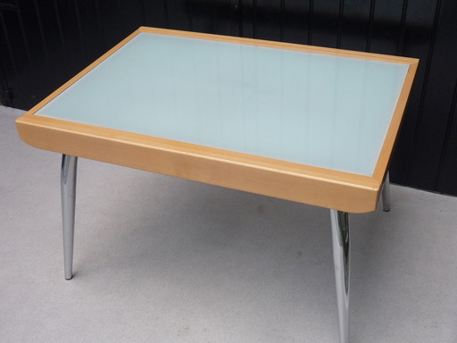 Eettafel van glas en hout