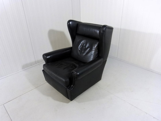 Image 1 of Zwart leren vintage wingback fauteuil op wieltjes 1960's