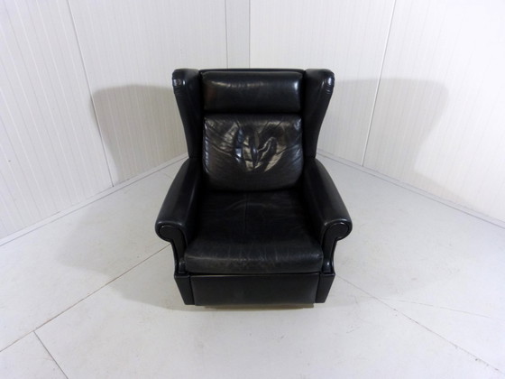 Image 1 of Zwart leren vintage wingback fauteuil op wieltjes 1960's