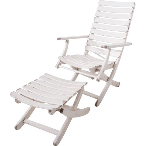 Vintage tuinstoel met voetensteun