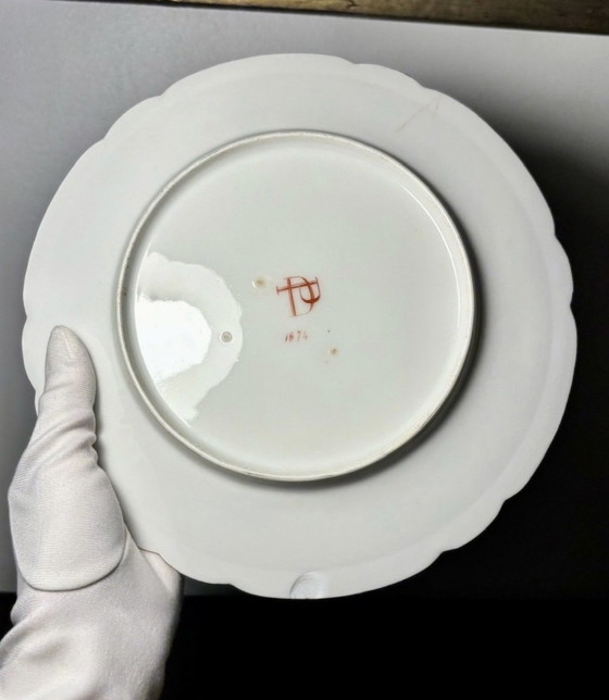 Image 1 of 2 versierde borden