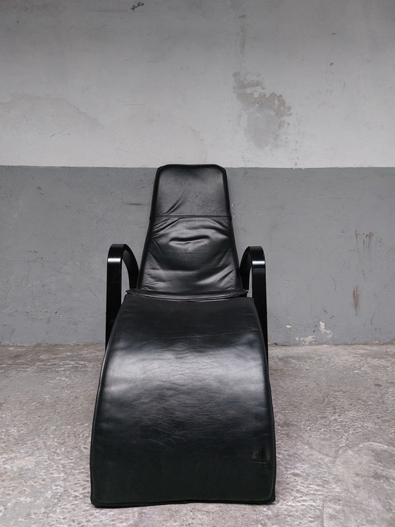 Image 1 of Black leather relax chair + Poef, 1989