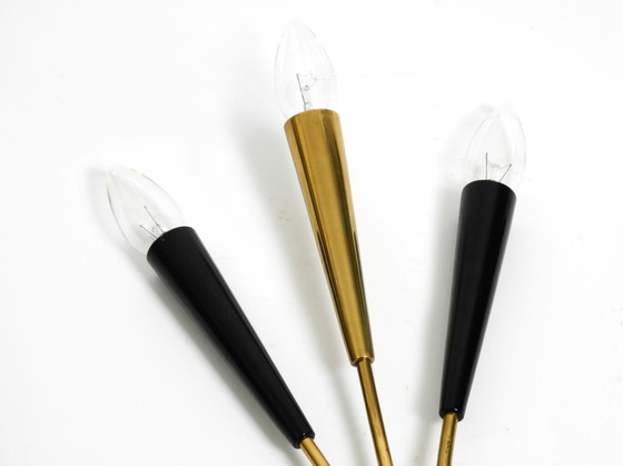 Image 1 of Twee prachtige grote Mid Century Moderne Messing 3-lichts kegel wandlampen