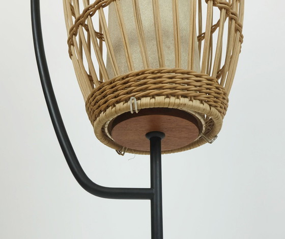 Image 1 of buitengewone en zeldzame Mid century FLOOR LAMP rotan vlechtwerk teak zwart metaal 1960