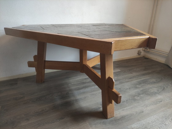 Image 1 of Vintage brutalist, sculptural eiken driehoek eettafel