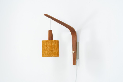 Wandlamp van multiplex en sisal (Denemarken, jaren 1960).