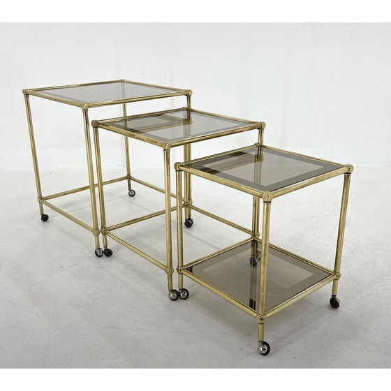 Image 1 of Italiaanse vintage nesttafels van messing en rookglas, jaren 1970