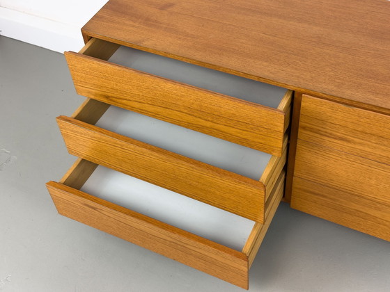 Image 1 of Laag teak dressoir met laden 1970S