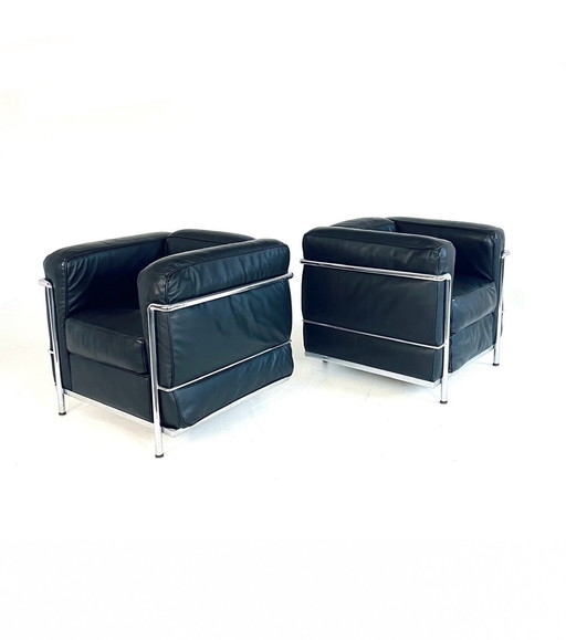 2X Leren Buisframe Fauteuils