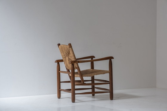 Image 1 of Zeldzaam paar fauteuils model 'Chamrousse' van Charlotte Perriand voor Steph Simon, Frankrijk 1940.