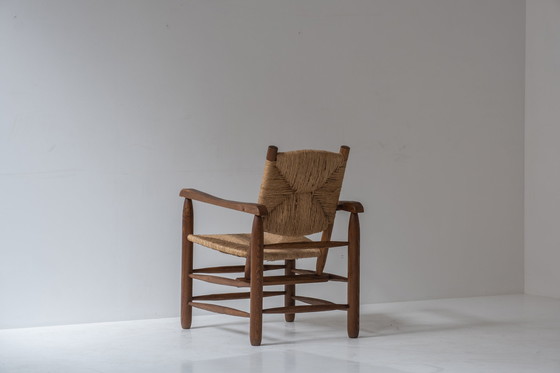 Image 1 of Zeldzaam paar fauteuils model 'Chamrousse' van Charlotte Perriand voor Steph Simon, Frankrijk 1940.