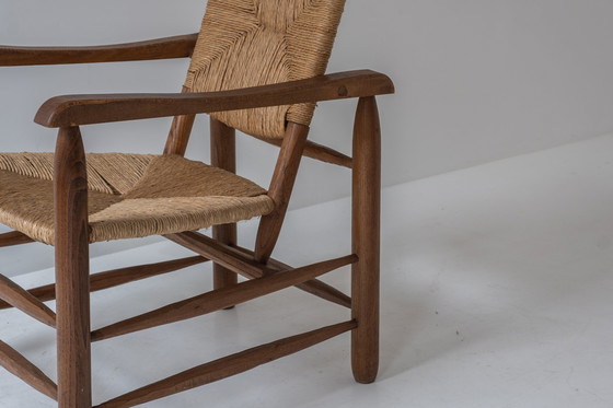 Image 1 of Zeldzaam paar fauteuils model 'Chamrousse' van Charlotte Perriand voor Steph Simon, Frankrijk 1940.