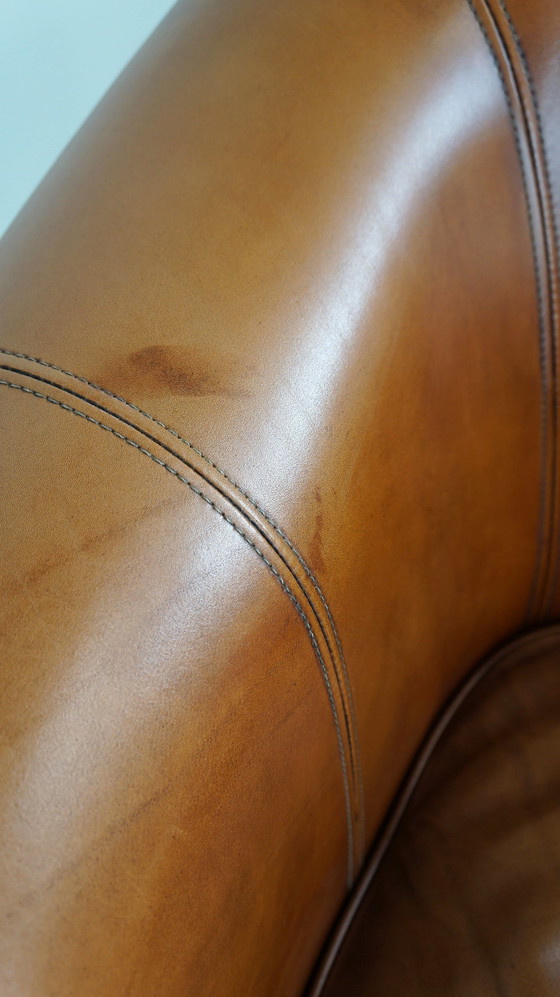 Image 1 of Rundleren clubfauteuil cognac kleur in Engelse stijl