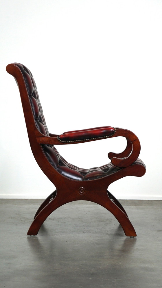 Image 1 of Donker rode gevlamde Engelse Chesterfield fauteuil van rundleer en hout, victoriaans model