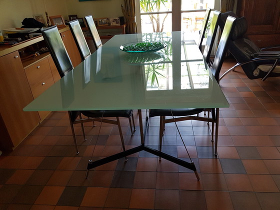 Image 1 of 6 Glazen tafel en lederen stoelen