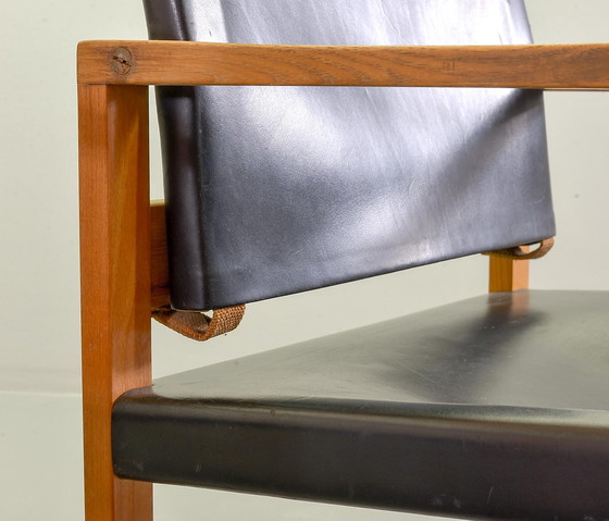 Image 1 of 2 Brutalistische Scandinavische Scandinavische massief eikenhouten fauteuils met zwart zadelleer, jaren 60.