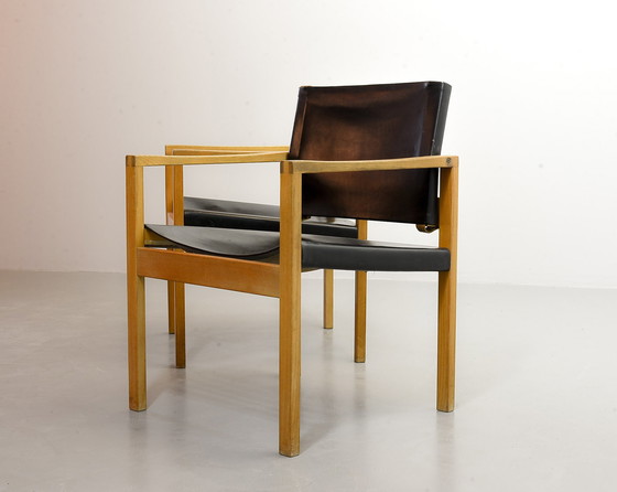 Image 1 of 2 Brutalistische Scandinavische Scandinavische massief eikenhouten fauteuils met zwart zadelleer, jaren 60.