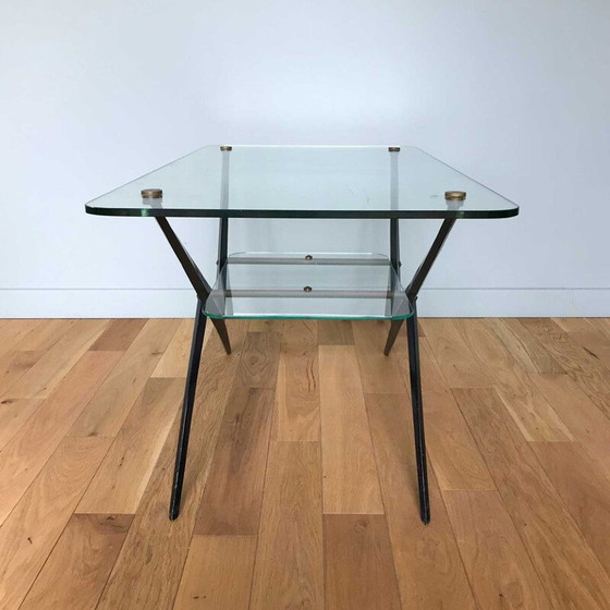 Image 1 of Vintage glazen en zwart metalen salontafel van Angelo Ostuni, 1950