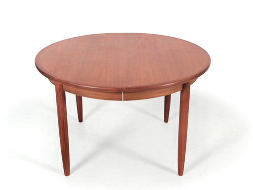 Scandinavische uitschuifbare teakhouten eettafel 4/8 pers.