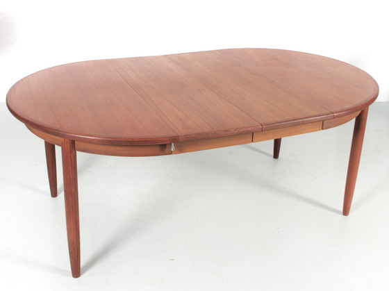 Image 1 of Scandinavische uitschuifbare teakhouten eettafel 4/8 pers.