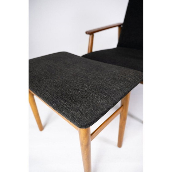 Image 1 of Vintage teakhouten fauteuil en kruk met donkere wollen stof Denemarken 1960