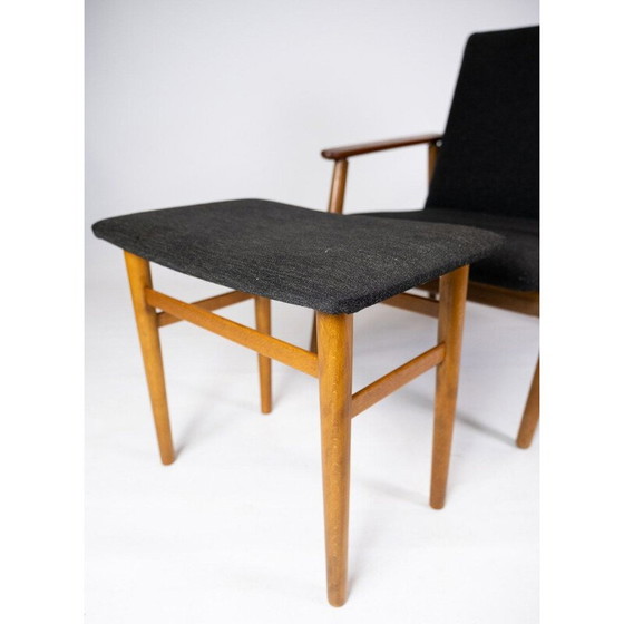 Image 1 of Vintage teakhouten fauteuil en kruk met donkere wollen stof Denemarken 1960