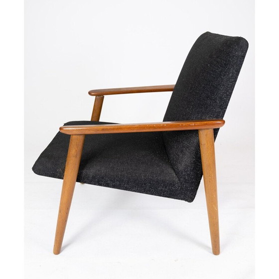 Image 1 of Vintage teakhouten fauteuil en kruk met donkere wollen stof Denemarken 1960