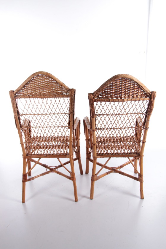 Image 1 of Vintage set van 2 Rotan stoelen gemaakt rond 1960s,Nederland.