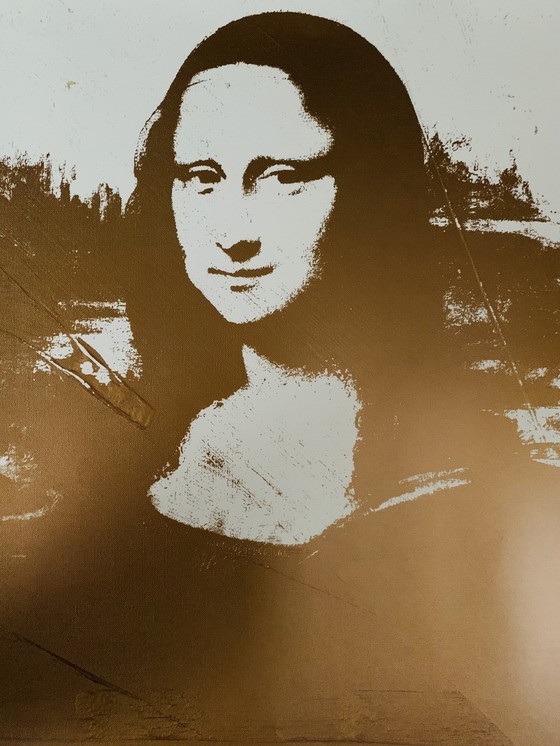 Image 1 of Andy Warhol: “Twee Gouden Mona Lisa”. In Groot Formaat. 