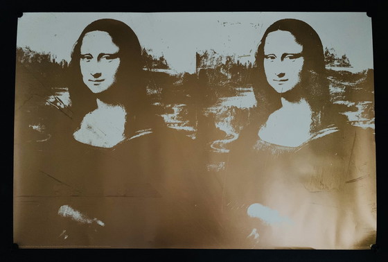 Image 1 of Andy Warhol: “Twee Gouden Mona Lisa”. In Groot Formaat. 