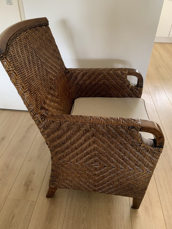 Image 1 of Een Prachtige Rotan Fauteuil Met Een Ecrukleurig Kussentje