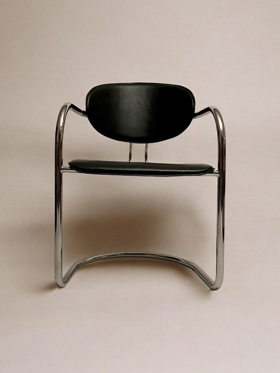 Image 1 of Serie van acht sledestoelen van Skaï, zwart en chroom