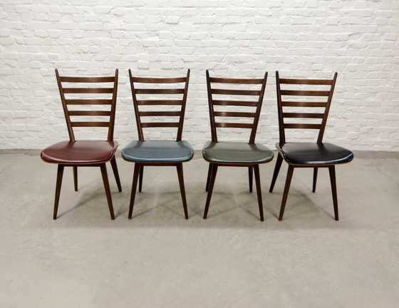 Image 1 of Set van vier 'Quattro Colori' teakhouten en kunstlederen eetkamerstoelen in de stijl van Cees Braakman. Nederland, jaren 1960.