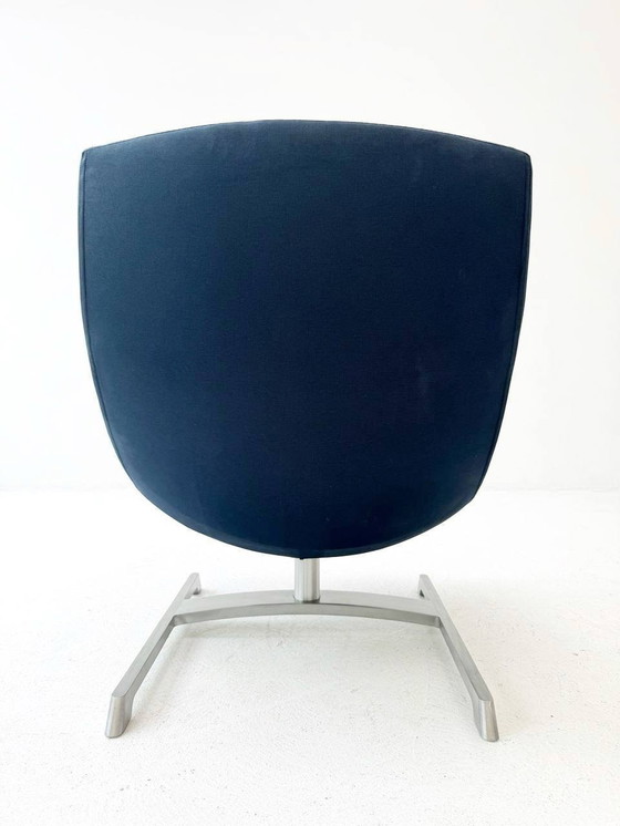 Image 1 of Middernachtblauwe Spin fauteuil en Ottoman van Hannes Wettstein voor Cassina, jaren 1980