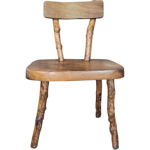 Brutalistische vintage stoel boomstam in massief hout