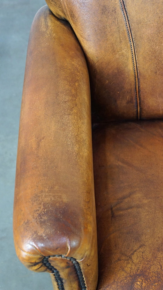 Image 1 of Vintage schapenleren fauteuil/ armchair met een fijne zit